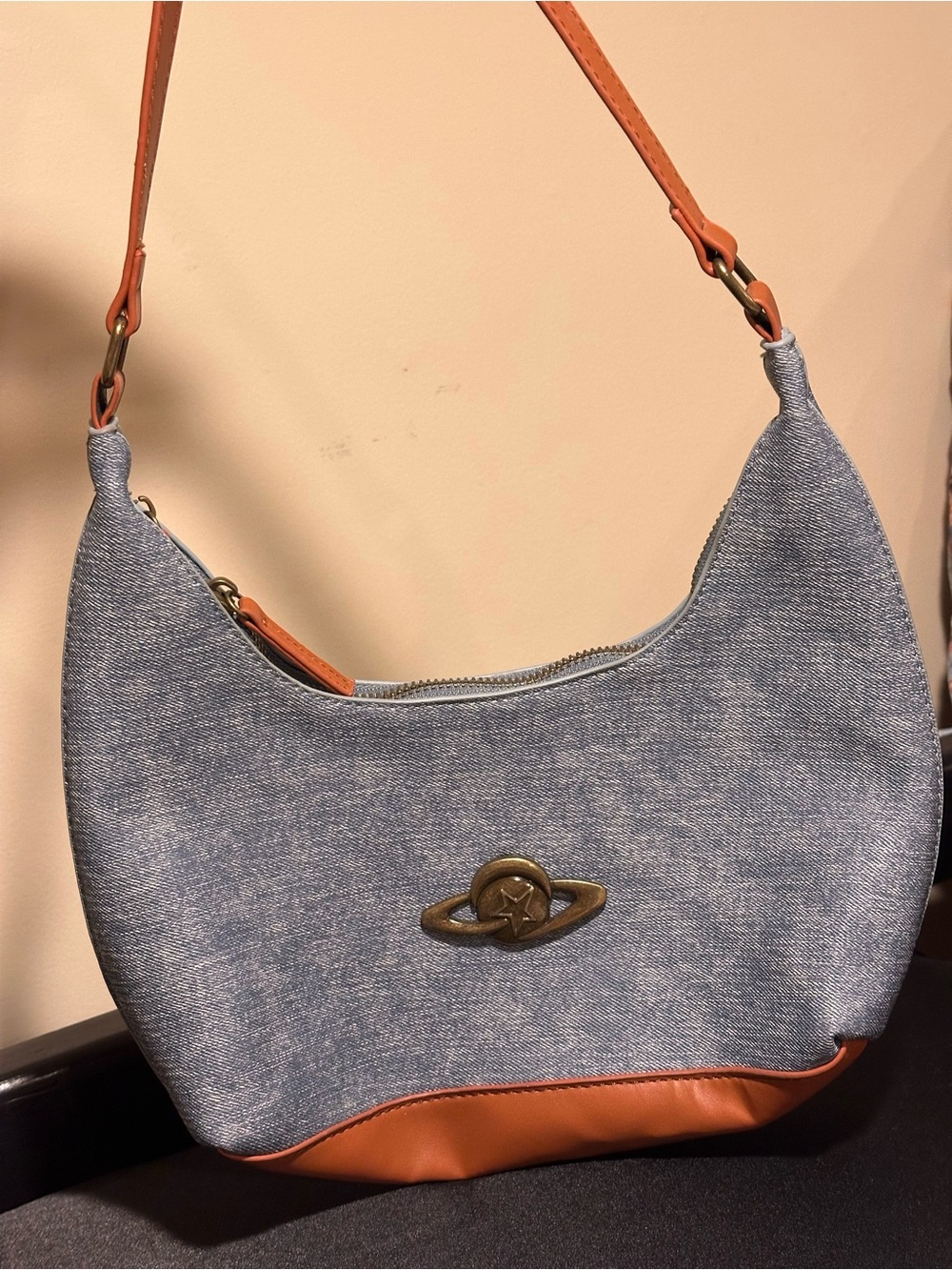 Denim Crescent Shoulder Bag with Tan Trim and Orb Emblem